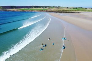 2 hour group lesson (3-16 people) - The 2-hour flow: car park, sand training, then wave time