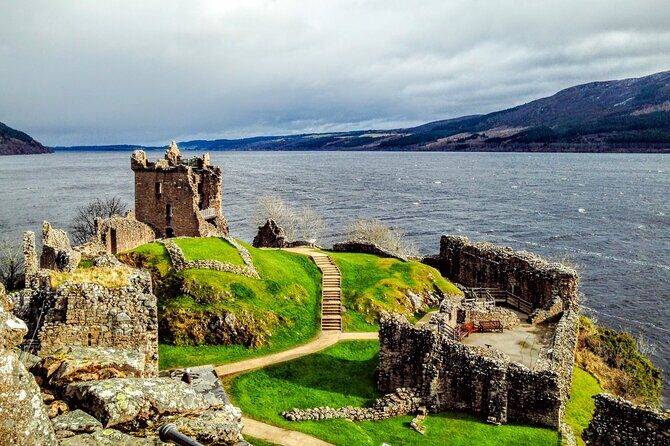 Inverness Highlands Bucket List Tour - Urquhart Castle ruins: Grant Tower, the prison story, and Loch Ness drama